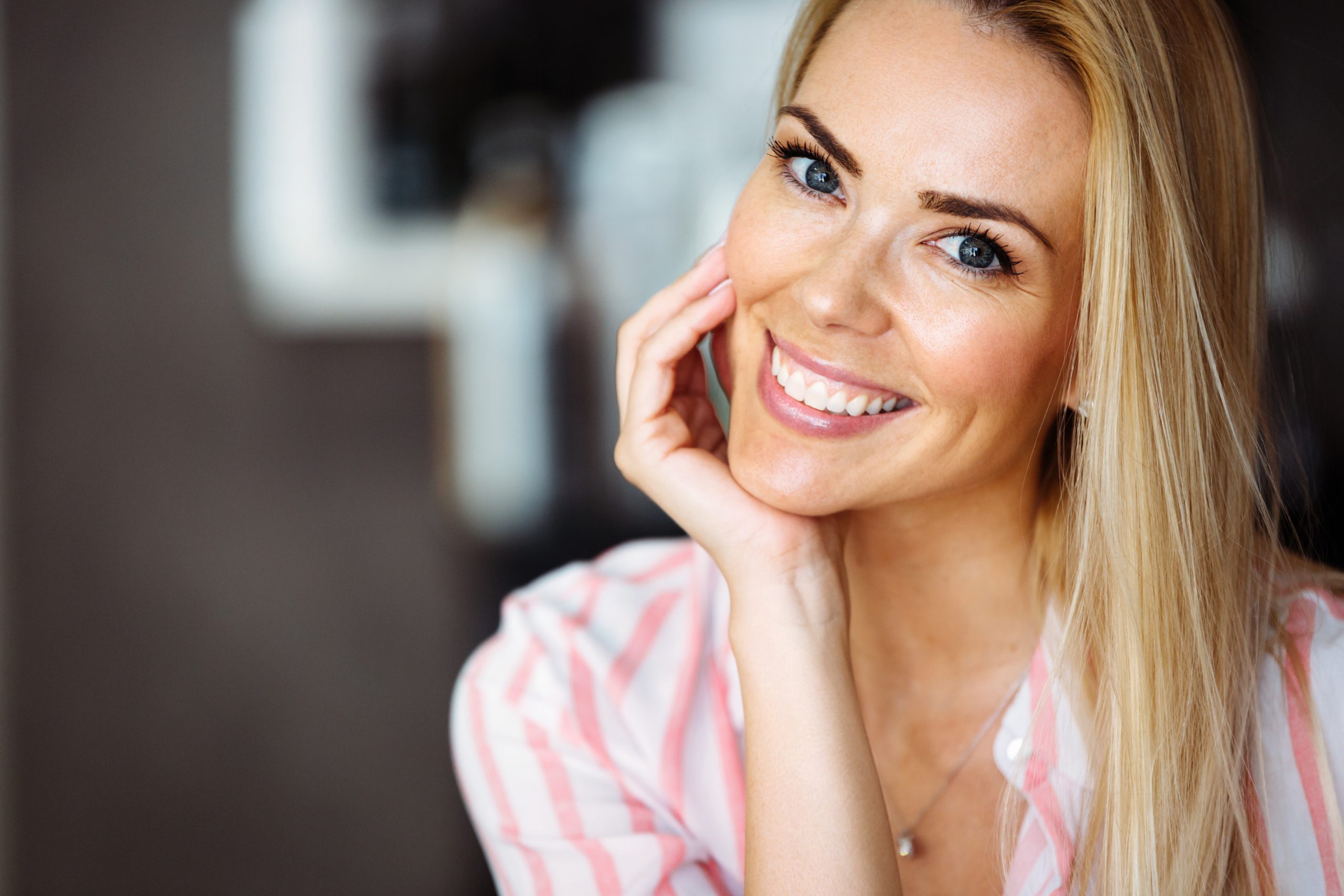 Portrait of beautiful blonde woman with blue eyes